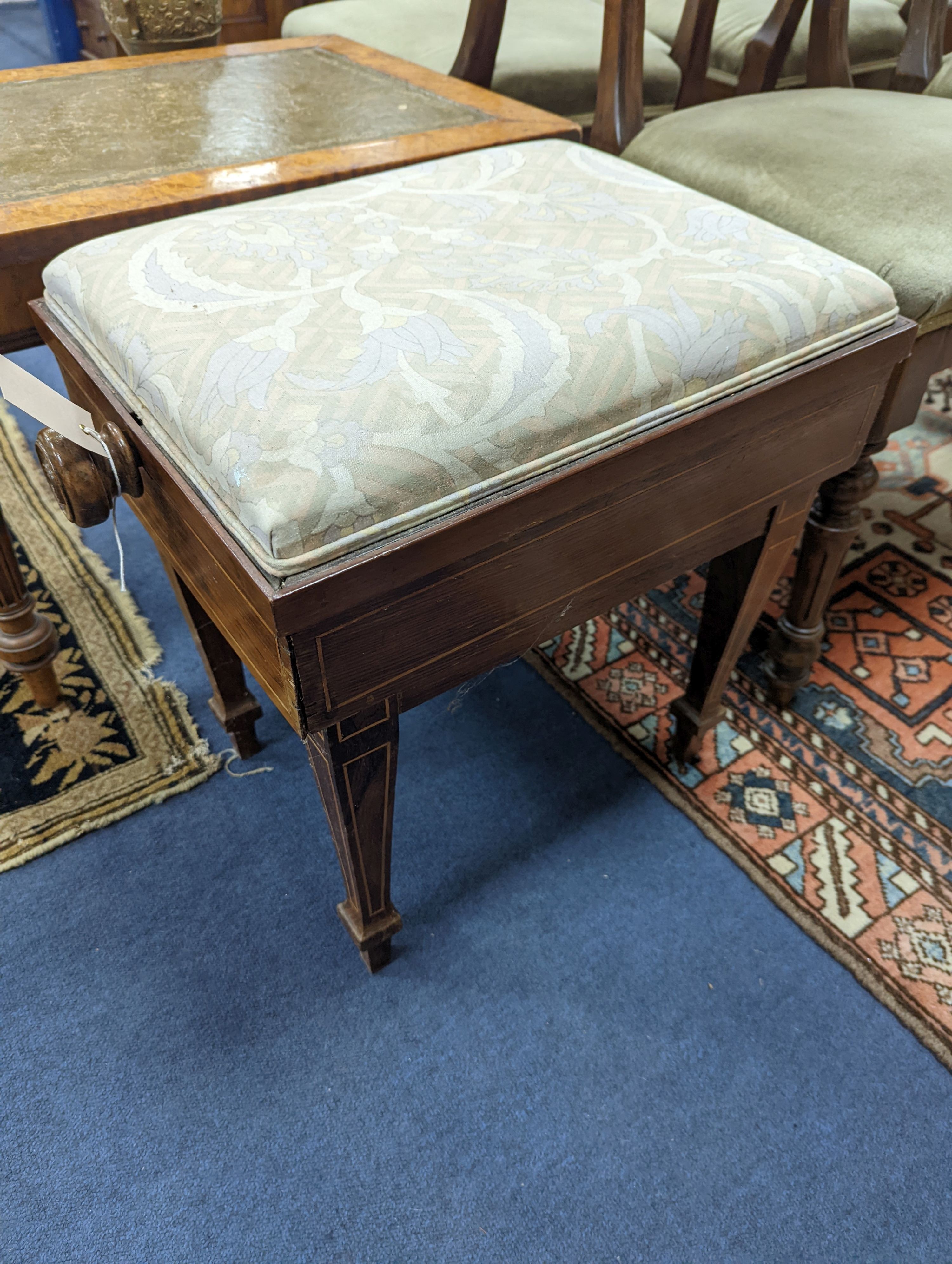 An Edwardian inlaid rosewood piano stool